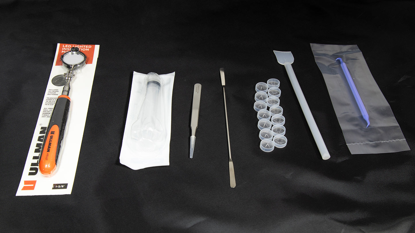 An assortment of parts displayed on a black background.