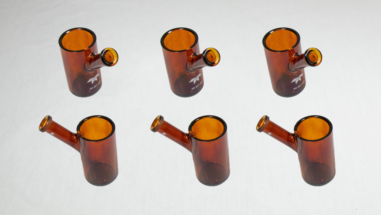 A group of six amber colored cells arranged on a plain white background.