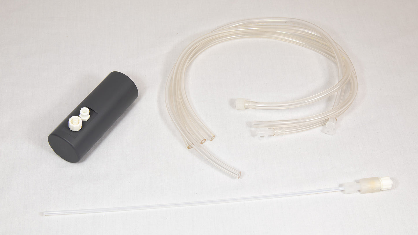 A small plastic apparatus with a hose and tube attachment, intended for fluid or air movement.