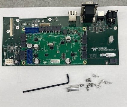A close-up of a motherboard featuring a USB port and a power supply connection.