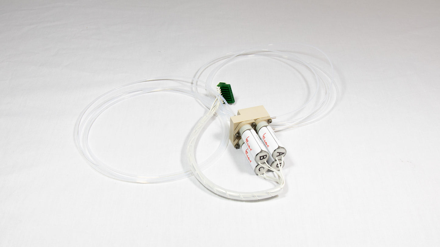 A valve with attached tubing, suggesting use in a laboratory or medical setting.