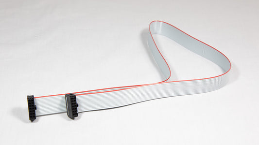 A white cable adorned with red and black stripes, showcasing a distinct pattern.