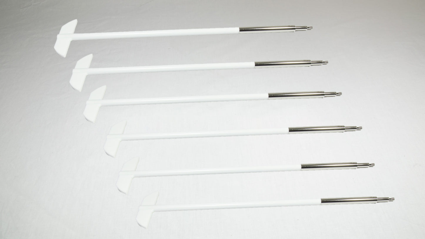 Six uniquely shaped metal rods positioned together for comparison.
