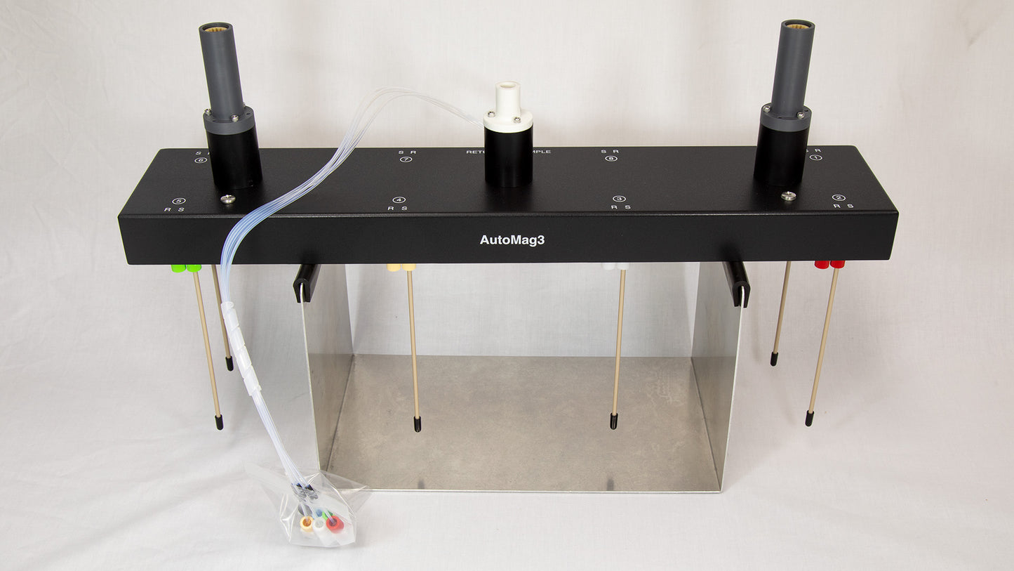An apparatus with tubing attached, indicating its operational setup and design.