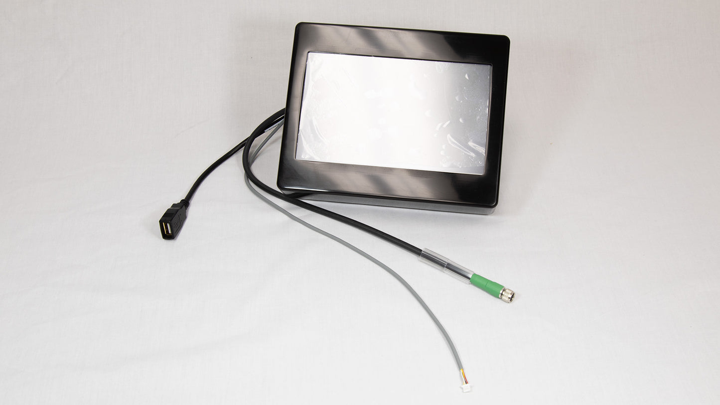 A compact electronic device featuring an attached cord for power or data connection.