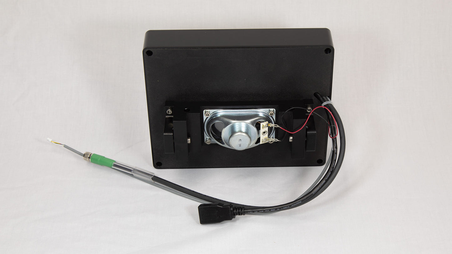 A compact electronic device featuring an attached cord for power or data connection.