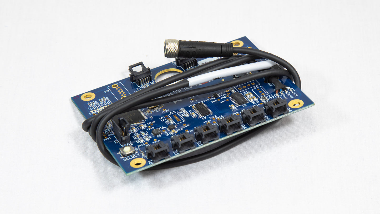 A compact electronic board featuring an attached cable, highlighting its functionality and layout.