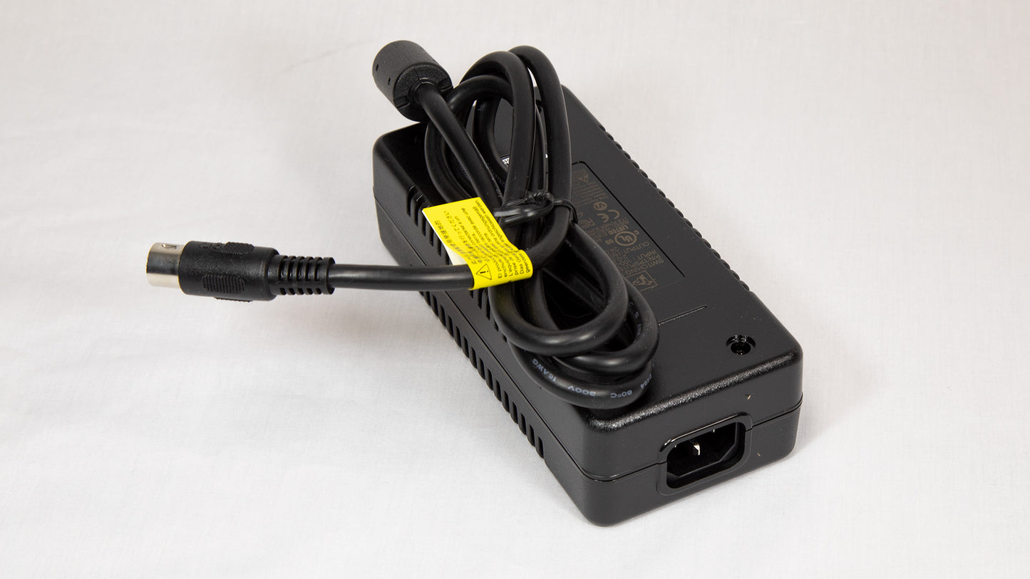 A power supply unit with a cord, designed for connecting electrical devices to an component.