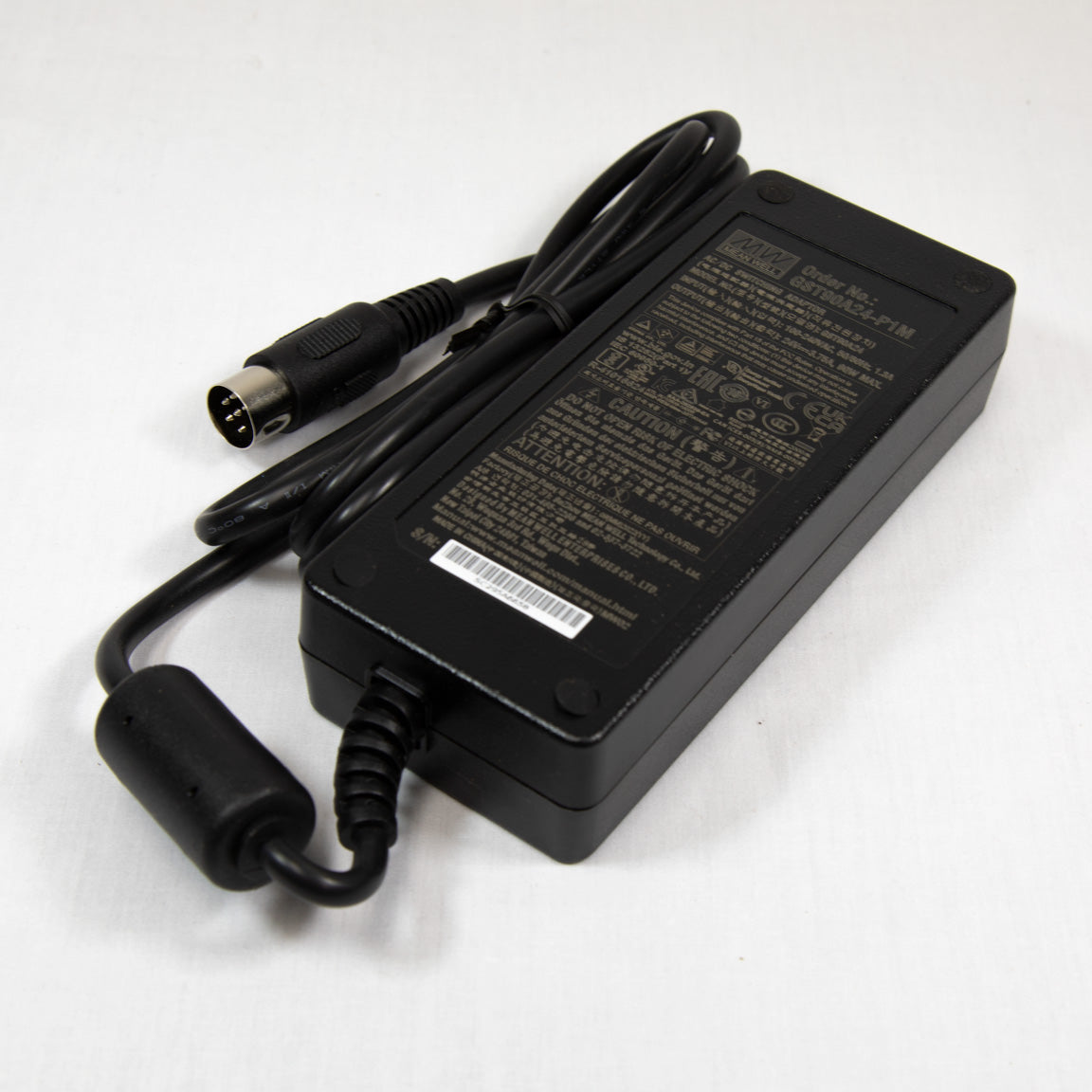 Black AC power adapter, featuring a standard plug and a compact design suitable for portable use.