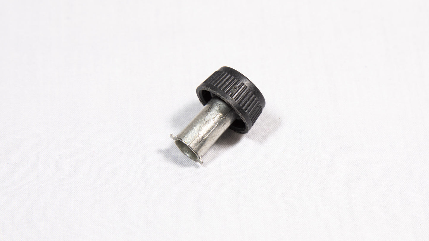 A black and stainless steel device displayed on a white background.