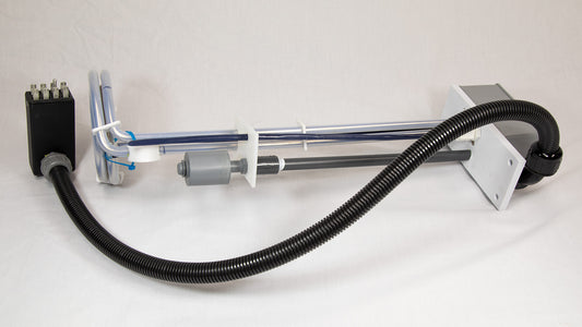 A close-up of a black cord attached to a device, highlighting their intertwined appearance.