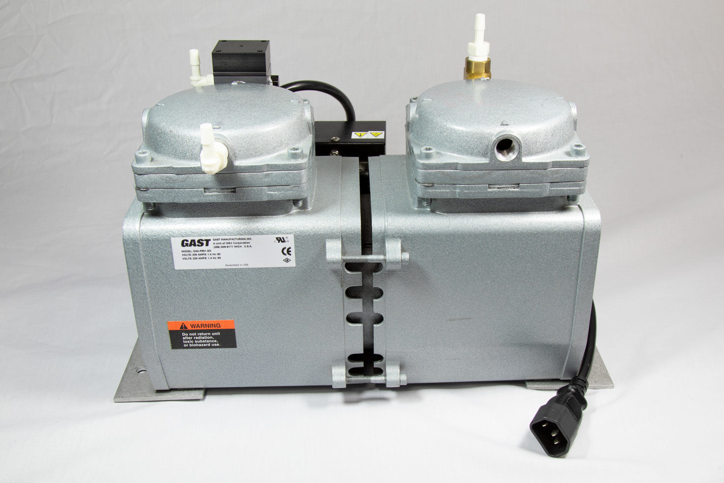 A small pump featuring two valves, designed for efficient control.