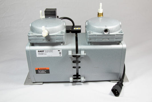 A small pump featuring two valves, designed for efficient control.