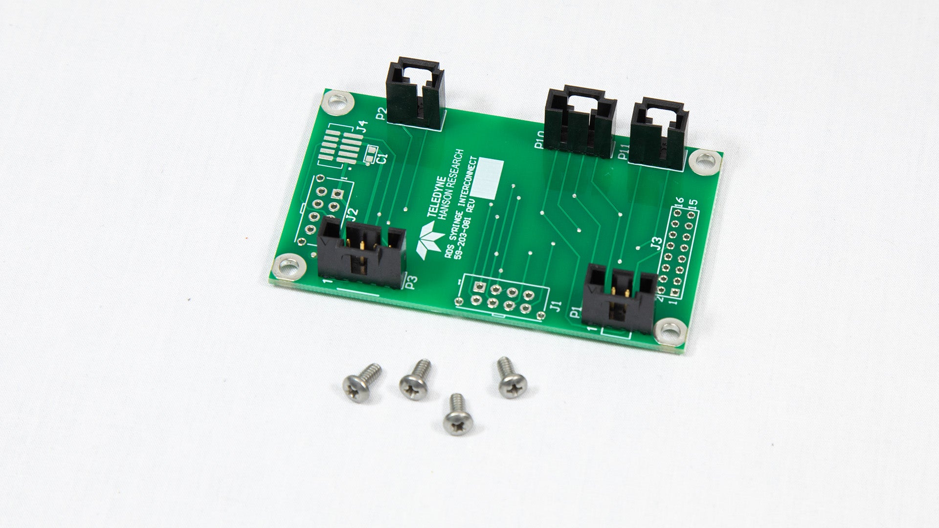 A miniature electronic board equipped with screws, illustrating its structural elements and assembly details.