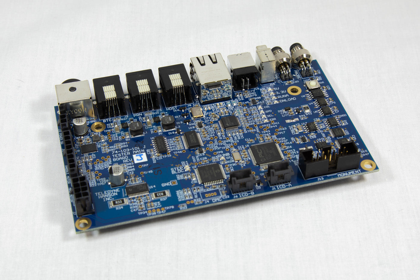 A small electronic circuit board featuring an number of components integrated into its design.