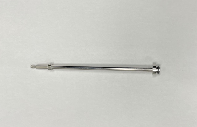 A metal rod featuring a small hole near one end, showcasing its design and potential use in various applications.