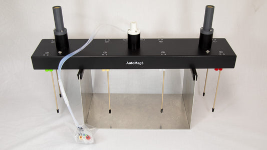 An apparatus with tubing attached, indicating its operational setup and design.
