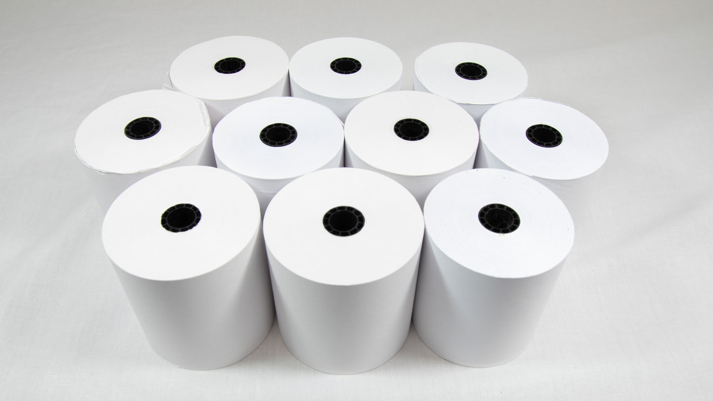 A cluster of white rolls arranged neatly on a white surface, creating a subtle and monochromatic visual effect.
