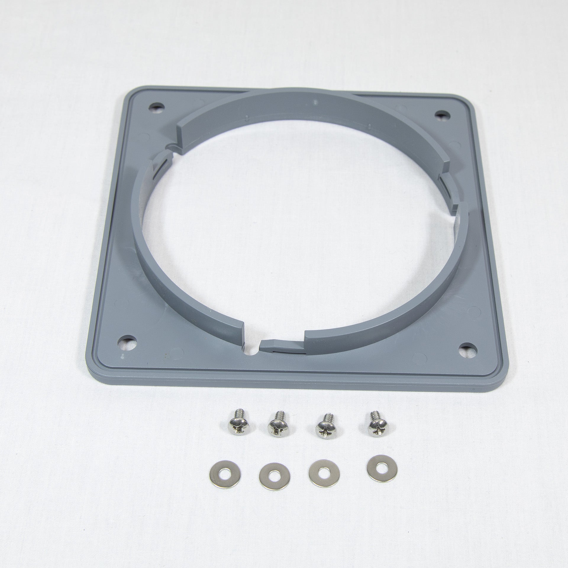 Gray plastic mounting plate accompanied by screws and nuts, arranged neatly for assembly or installation purposes.
