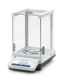 Clear plastic case with scale and control pad.